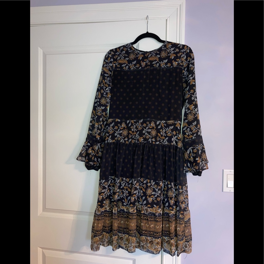 Chiffon dress with gold shiny threading.
